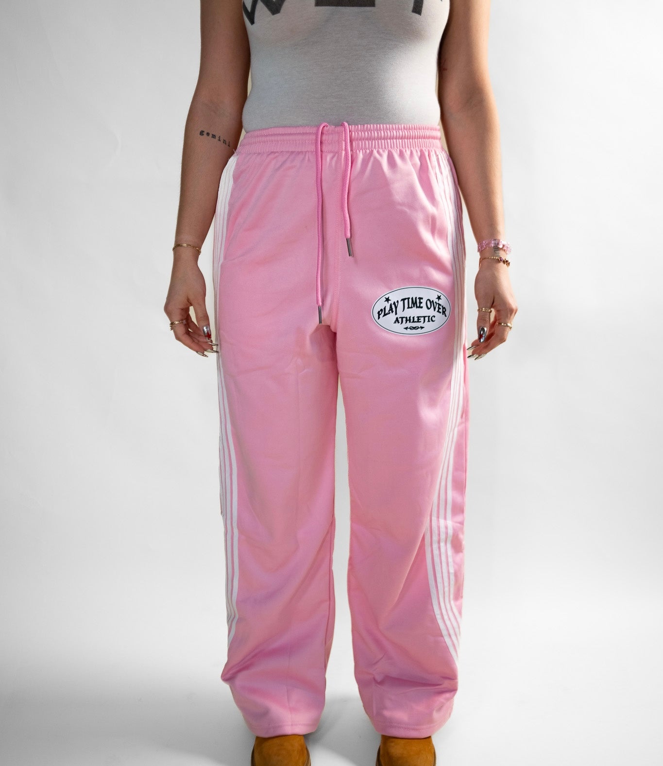 Pink shops joggers with white stripe